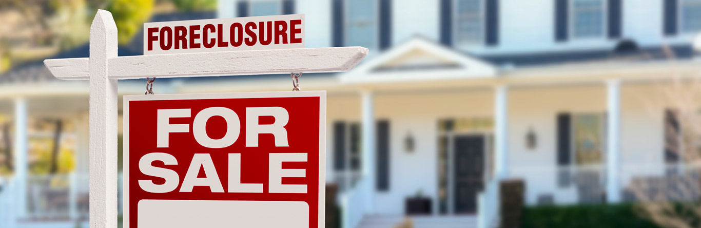 foreclosure sign outside house